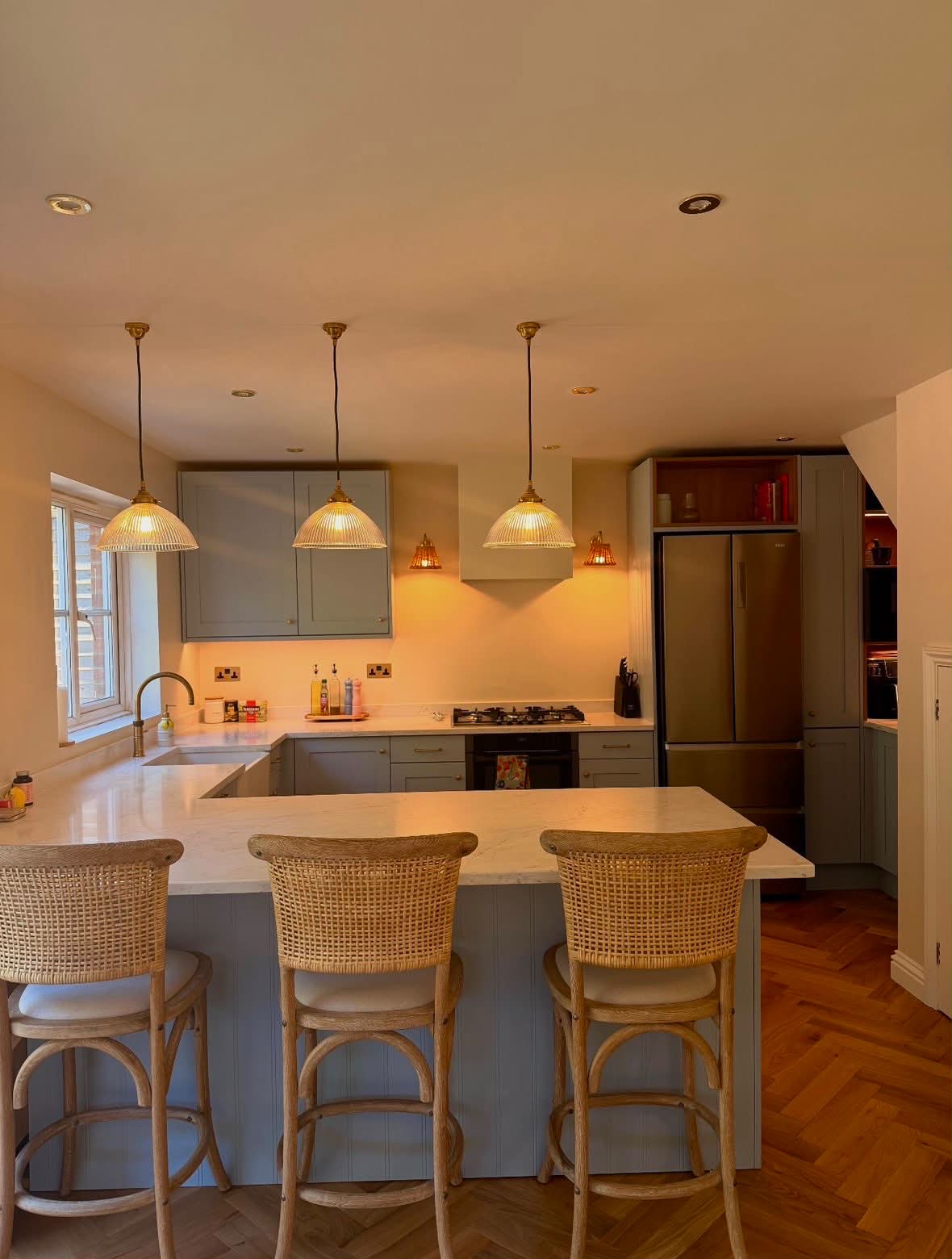 Residential kitchen glass dome pendant lights, recessed downlights and island lighting installation